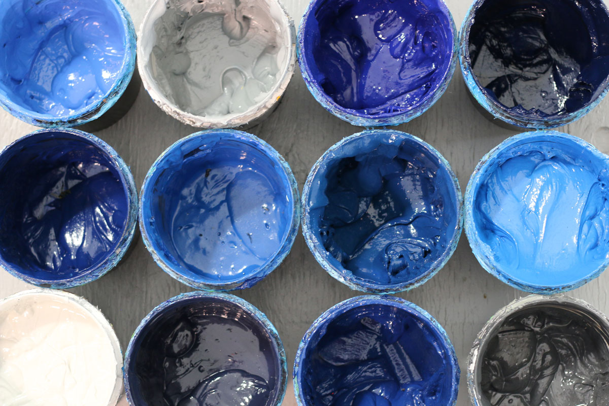 Colorful screen-printing inks in the shop’s published process photography